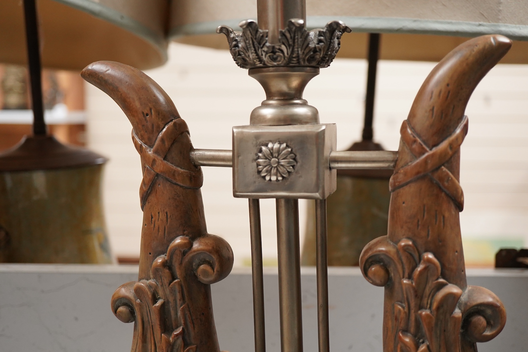 A pair of Maitland-Smith lyre shaped tablelamps